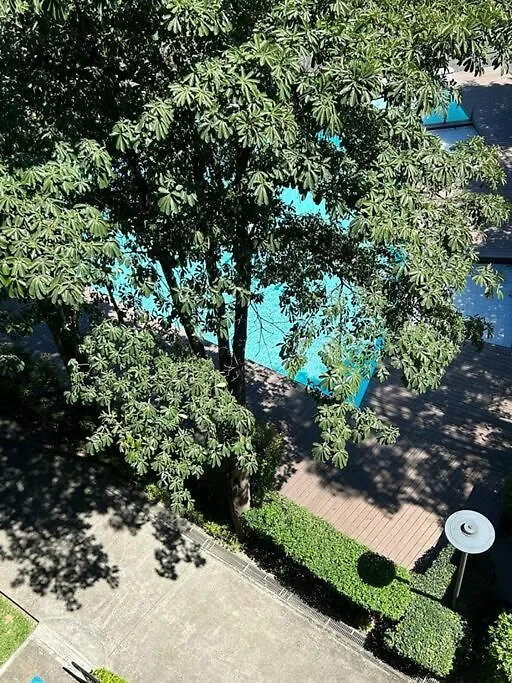 Modern Oasis: Pool + Netflix Apartment Manila